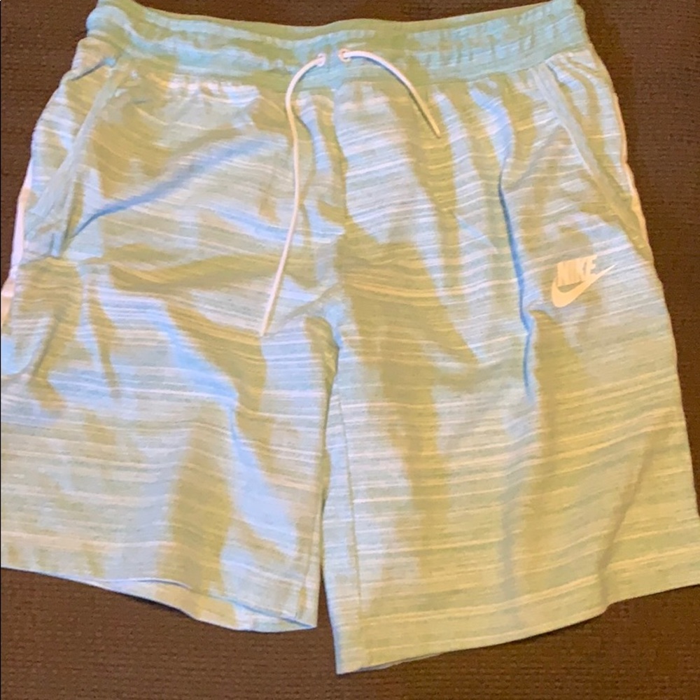 Green Nike shorts